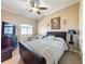 Spacious bedroom with a king-size bed and plenty of natural light at 164 Sunrise Hill Ln, Auburndale, FL 33823