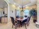 Formal dining room with a wood table and six chairs at 164 Sunrise Hill Ln, Auburndale, FL 33823