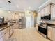 Kitchen with stainless steel appliances and granite counters at 164 Sunrise Hill Ln, Auburndale, FL 33823