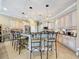 Kitchen with an island and stainless steel appliances at 164 Sunrise Hill Ln, Auburndale, FL 33823