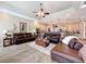 Open living room with a view into kitchen at 164 Sunrise Hill Ln, Auburndale, FL 33823