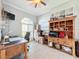 Home office with wood desk, hutch, and ample storage at 164 Sunrise Hill Ln, Auburndale, FL 33823