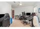 Workstation featuring audio equipment, computers, and a keyboard at 3200 Canna Lily Pl, Clermont, FL 34711