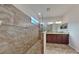 Bathroom with double vanity, granite countertop, and large walk-in shower at 3537 Raleigh Dr, Winter Haven, FL 33884