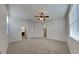 Spacious bedroom with carpeted floors and ceiling fan at 3537 Raleigh Dr, Winter Haven, FL 33884