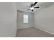 Spacious bedroom with ceiling fan and carpet at 3537 Raleigh Dr, Winter Haven, FL 33884