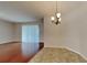 Dining area with hardwood floors and a chandelier at 3537 Raleigh Dr, Winter Haven, FL 33884