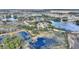 Aerial view showing home location in a lakefront community at 108 La Cresta Ct, Davenport, FL 33837