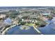 Aerial view showing home's location near lake at 108 La Cresta Ct, Davenport, FL 33837