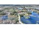 Aerial view showing the home's location within a tranquil community at 108 La Cresta Ct, Davenport, FL 33837