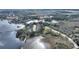 Aerial view showcasing home's location near a lake and conservation area at 108 La Cresta Ct, Davenport, FL 33837