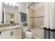 Bathroom with a bathtub, granite countertop, and neutral tile at 108 La Cresta Ct, Davenport, FL 33837