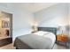 Guest bedroom with gray bed, nightstands, and neutral wall colors at 108 La Cresta Ct, Davenport, FL 33837