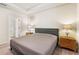 Comfortable bedroom with carpeted floors and ensuite bathroom access at 108 La Cresta Ct, Davenport, FL 33837
