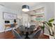 Dining room with round table and kitchen view at 108 La Cresta Ct, Davenport, FL 33837
