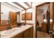 Double vanity bathroom with view of bedroom at 2028 Marker Rd, Polk City, FL 33868