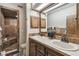 Bathroom with double vanity and shower at 2028 Marker Rd, Polk City, FL 33868