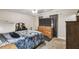 Spacious bedroom with dresser and TV at 2028 Marker Rd, Polk City, FL 33868
