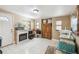 Versatile bonus room with tile floor, fireplace, and ample storage at 2028 Marker Rd, Polk City, FL 33868
