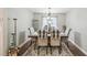 Bright dining room with farmhouse table and chairs at 2028 Marker Rd, Polk City, FL 33868