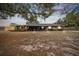Ranch-style home with a large yard and mature trees at 2028 Marker Rd, Polk City, FL 33868