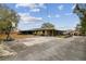 Home with a long driveway and basketball court at 2028 Marker Rd, Polk City, FL 33868
