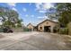Detached garage with plenty of storage space at 2028 Marker Rd, Polk City, FL 33868