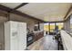 Outdoor kitchen with refrigerator and ample counter space at 2028 Marker Rd, Polk City, FL 33868