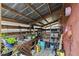 Outdoor potting area with sink and storage for gardening supplies at 2028 Marker Rd, Polk City, FL 33868