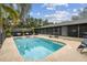 Relaxing swimming pool with screened patio at 2028 Marker Rd, Polk City, FL 33868