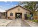 Large workshop with stone accents and double doors at 2028 Marker Rd, Polk City, FL 33868