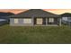 Large backyard with patio and grassy area at 7021 Bentridge Dr, Lakeland, FL 33813