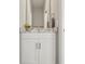 Stylish bathroom with white vanity and marble top at 7021 Bentridge Dr, Lakeland, FL 33813