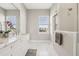 Elegant bathroom with marble countertops and a large shower at 7021 Bentridge Dr, Lakeland, FL 33813