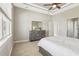 Serene bedroom with carpeted floor and dresser at 7021 Bentridge Dr, Lakeland, FL 33813