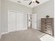 Spacious bedroom with double doors and closet at 7021 Bentridge Dr, Lakeland, FL 33813