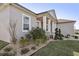 Landscaped front yard with bushes and stone accents at 7021 Bentridge Dr, Lakeland, FL 33813