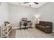 Bright home office features built-in shelving and a comfortable couch at 7021 Bentridge Dr, Lakeland, FL 33813