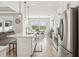 Spacious kitchen with island, stainless steel appliances, and white cabinets at 7021 Bentridge Dr, Lakeland, FL 33813