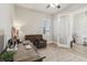 Home office with built-in desk and comfortable seating at 7021 Bentridge Dr, Lakeland, FL 33813