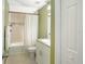 Clean bathroom with a bathtub, shower, and white vanity at 1314 W Highland St, Lakeland, FL 33815