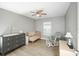 Bedroom with crib, dresser, and rocking chair at 1314 W Highland St, Lakeland, FL 33815