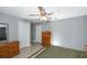 Bedroom with wood dresser and ceiling fan at 1314 W Highland St, Lakeland, FL 33815