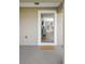 Front door entrance with a view into the living room and kitchen at 1314 W Highland St, Lakeland, FL 33815