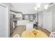 Open concept kitchen with island and stainless steel appliances at 1314 W Highland St, Lakeland, FL 33815