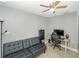 Office space with a desk, chair, and comfortable couch at 1314 W Highland St, Lakeland, FL 33815
