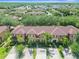 Townhome community with lush landscaping at 225 Cambria Ave, Davenport, FL 33897