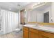 Clean bathroom with a shower/tub combo and updated vanity at 225 Cambria Ave, Davenport, FL 33897