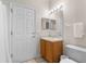 Simple bathroom with single sink vanity and toilet at 225 Cambria Ave, Davenport, FL 33897