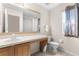 Clean bathroom with single sink vanity and toilet at 225 Cambria Ave, Davenport, FL 33897